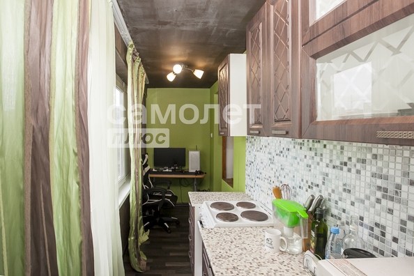 
   Продам 1-комнатную, 30.3 м², Строителей б-р, 56/2

. Фото 11.
